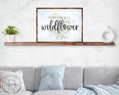 In a Field of Roses She Is a Wildflower